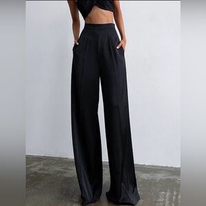 Oversized Satin Wide Leg Dress Pants
Color: Black NWOT Size Small Pockets